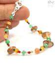 Armband in Grün- und Orangetönen